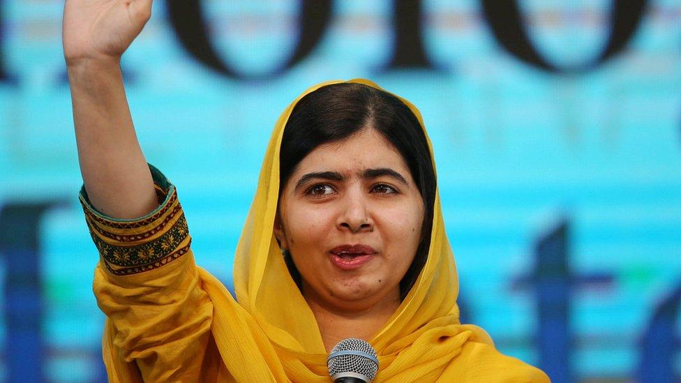 Nobel laureate Malala Yousafzai waves as she arrives for an event with students at Tecnologico de Monterrey University in Mexico City