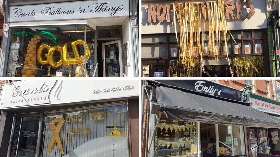 Four gold shop fronts in Coventry