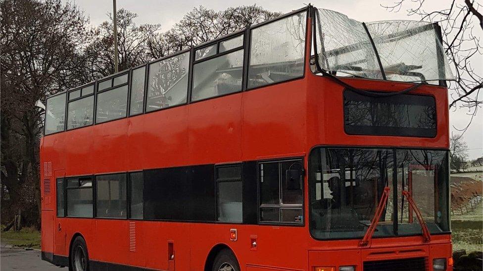 Bus with roof missing