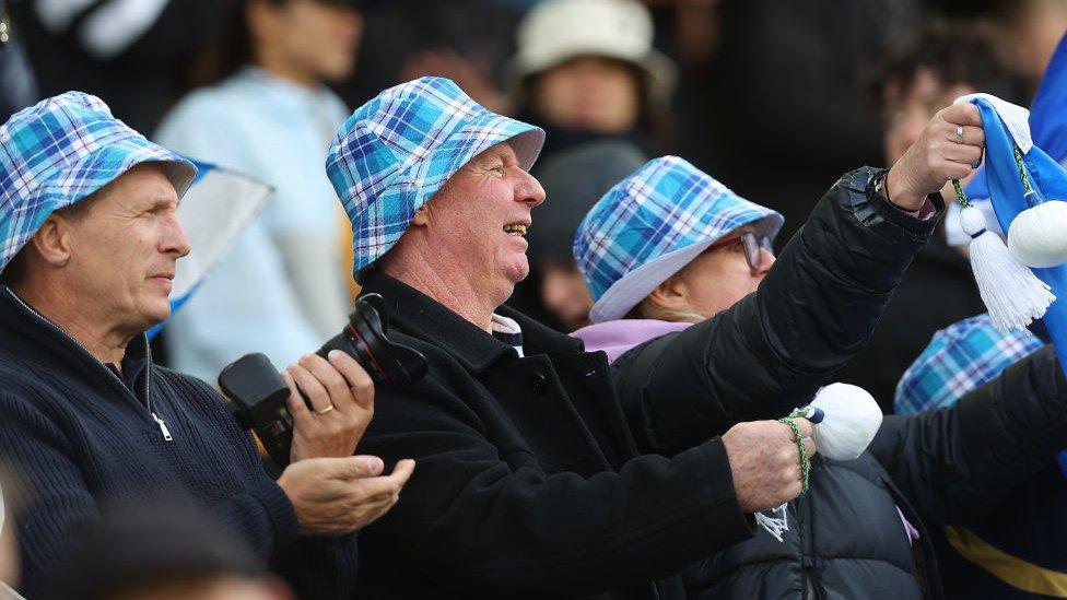 Scottish fans in tartan hats