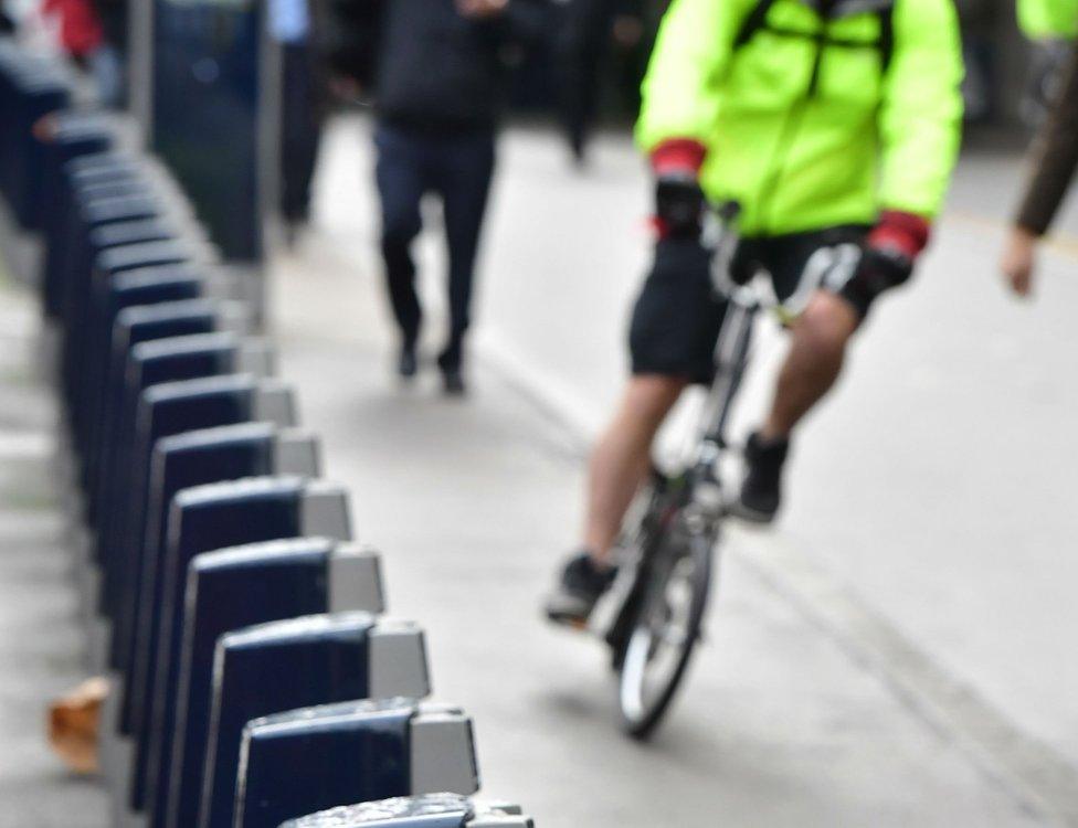 A row of empty cycle hire docking stations near Waterloo Station