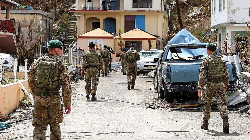 Soldiers in Tortola in the British Virgin Isles where homes are devastated