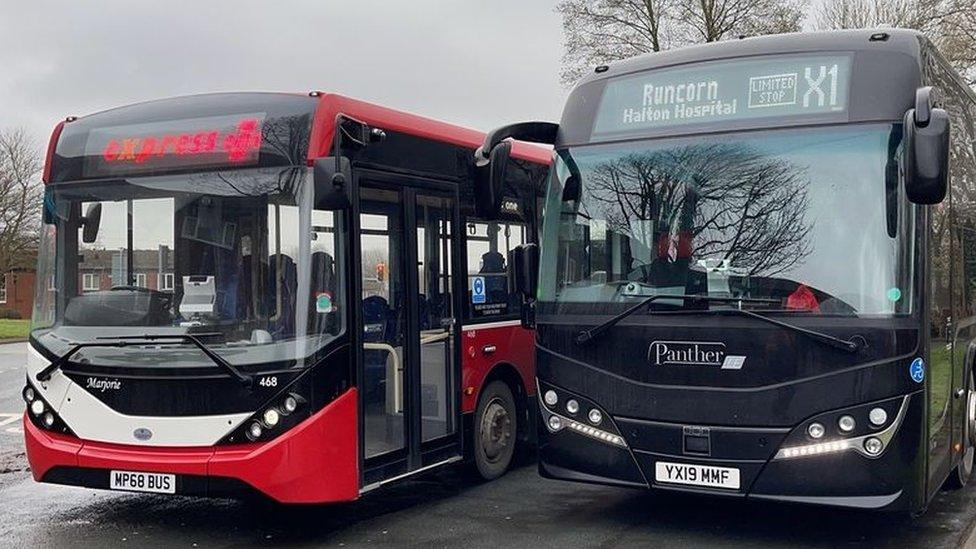 Two single decker buses