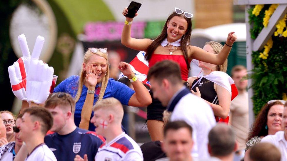 Fans celebrate at the final whistle at the 4TheFans fan zone in Manchester