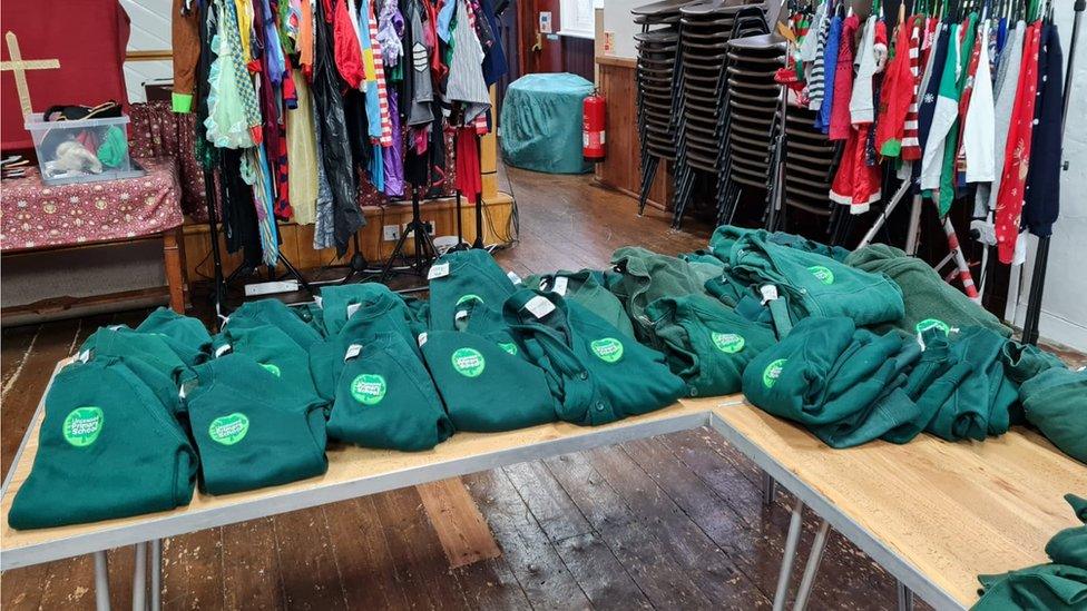 School jumpers on a table