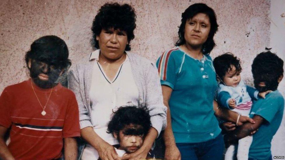 Aceves (left) as a child with his family