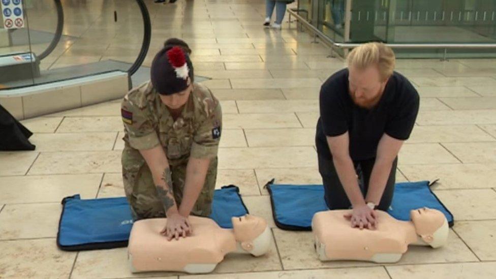 CPR session with dummies on floor