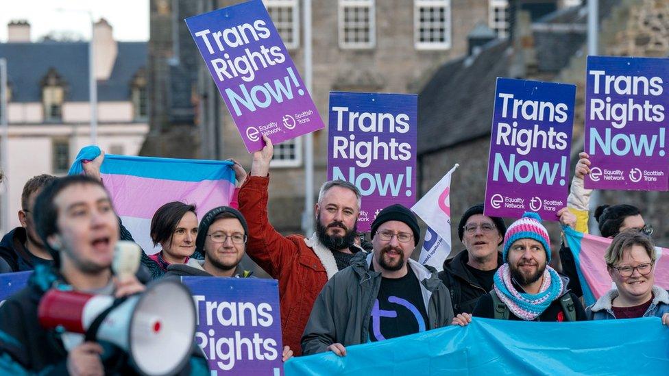 Supporters of Scotland's gender recognition bill take part in a protest outside Parliament in Edinburgh, December 2022