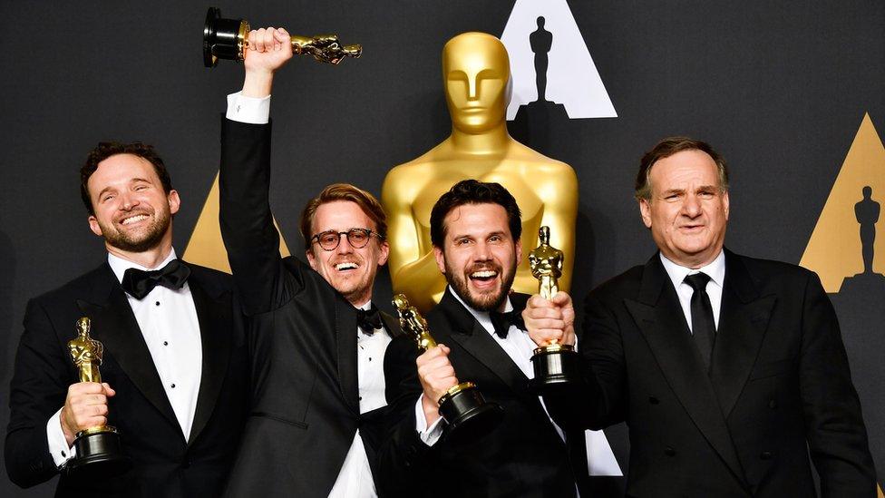 Visual effects artists Dan Lemmon, Andrew R. Jones, Adam Valdez and Robert Legato, winners of Best Visual Effects for 'The Jungle Book' pose in the press room during the 89th Annual Academy Awards at Hollywood Highland Center on February 26, 2017 in Hollywood, California.