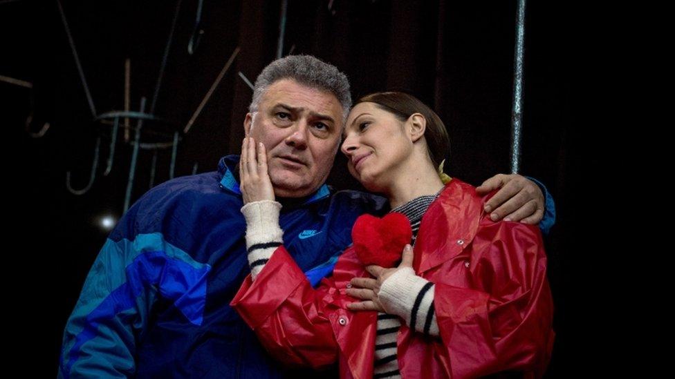 Actress Ivana Kovacevic (R) as Mira Markovic, wife of former Serbian strongman Slobodan Milosevic, and actor Dejan Cicmilovic, as Milosevic perform on stage during a rehearsal of the play "Slobodan Show" in a theatre in Belgrade on 27 February 2018