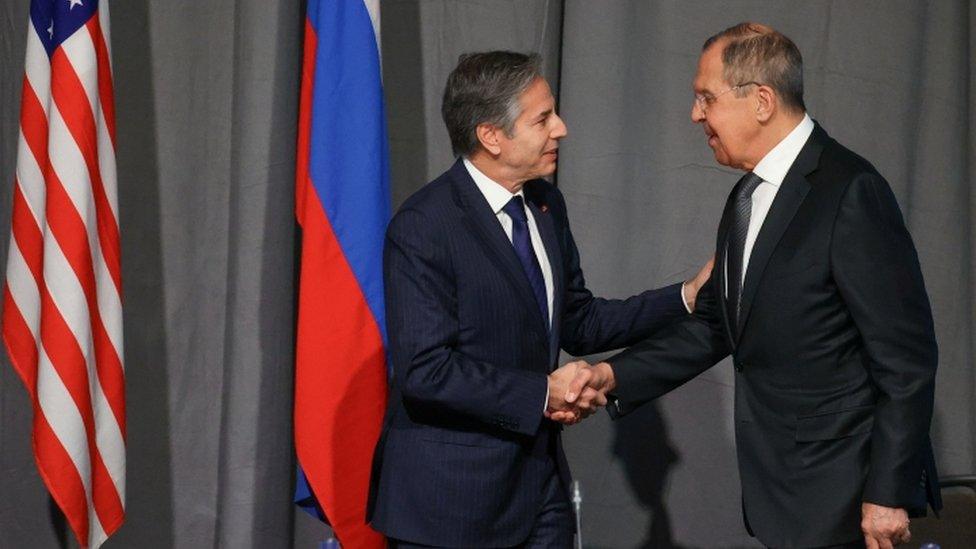 US Secretary of State Antony Blinken and Russian Foreign Minister Sergei Lavrov shake hands during a meeting of the Organization for Security and Co-operation in Europe, Stockholm, Sweden December 2, 2021.