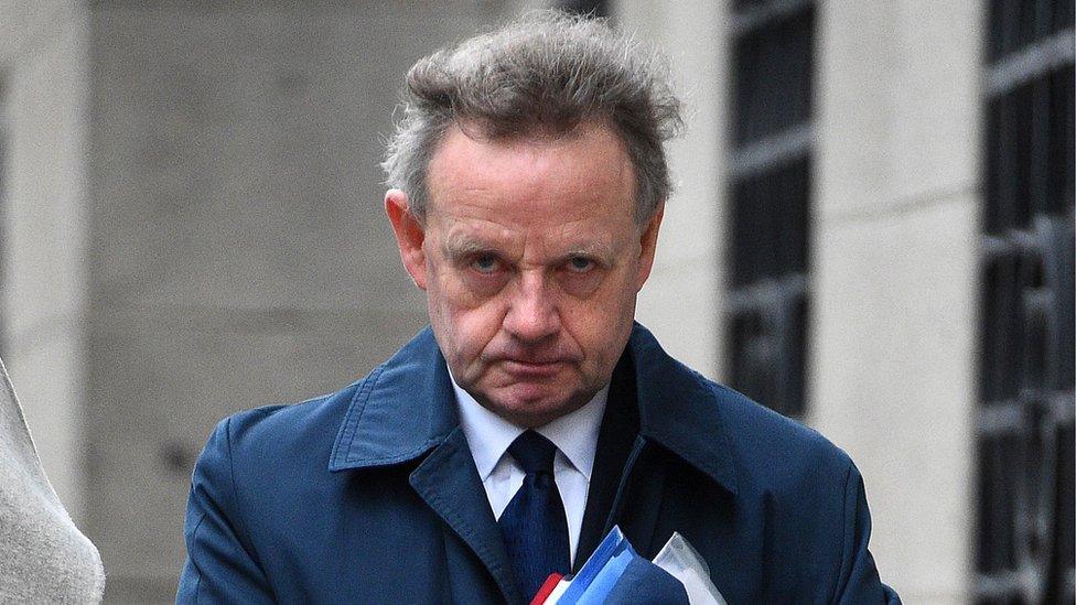 Andy Hill arriving at court on first day of defence - 13/2/19