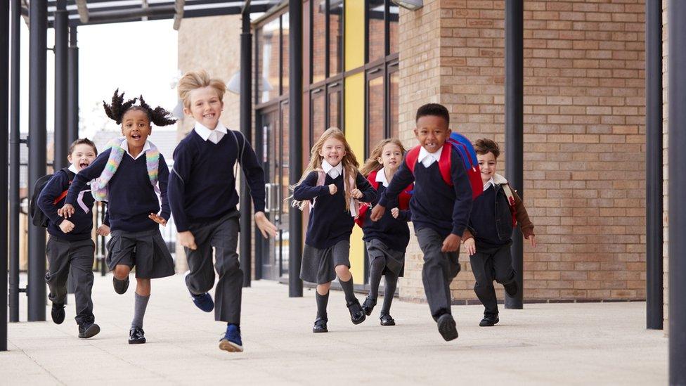 kids running at school