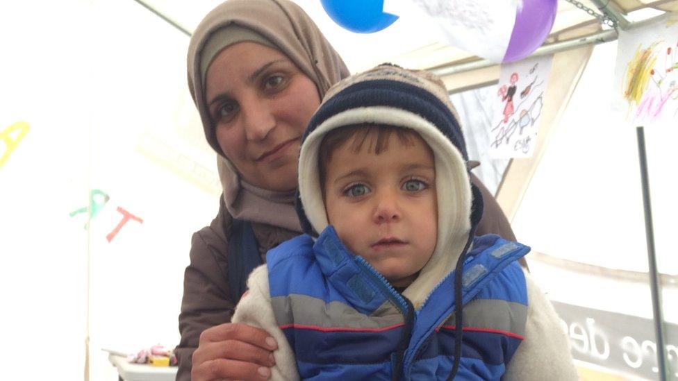 Malak Al-Maari with her son Hommam, 2 years old