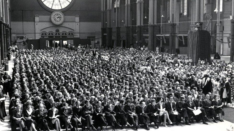 The first Open University degree ceremony held in the Great Hall of Alexandra Palace on Saturday 23 June 1973. Part of the ceremony was broadcast live on BBC2.