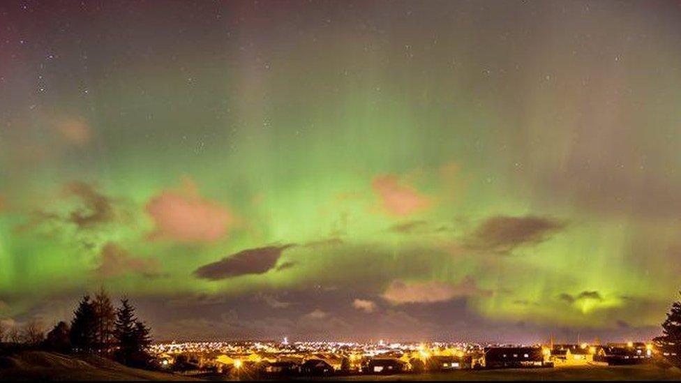Aurora looking over Elgin in Scotland