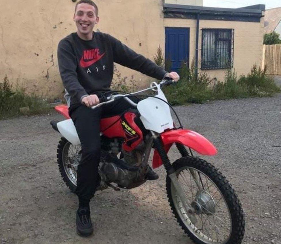 James Ferguson posing on a bike