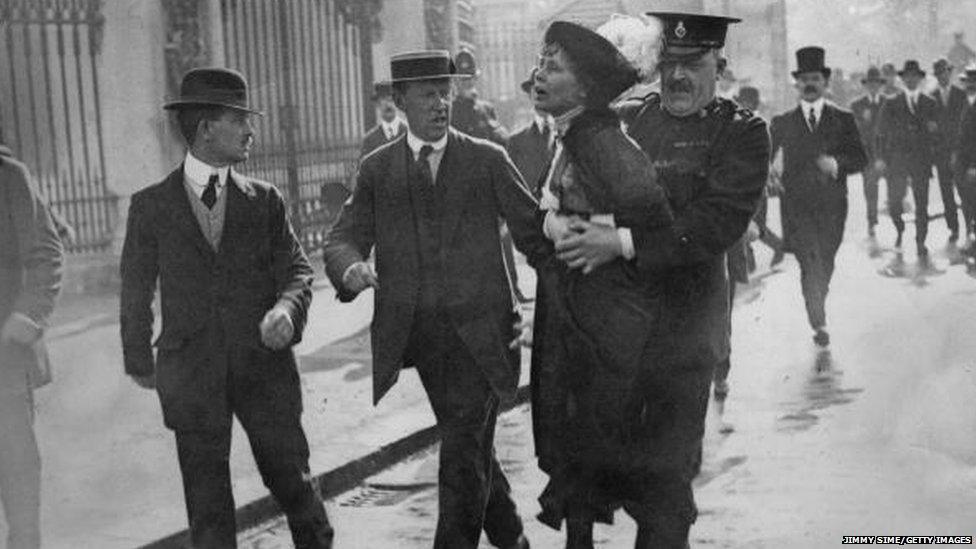 Emmeline Pankhurst being arrested outside Buckingham Palace