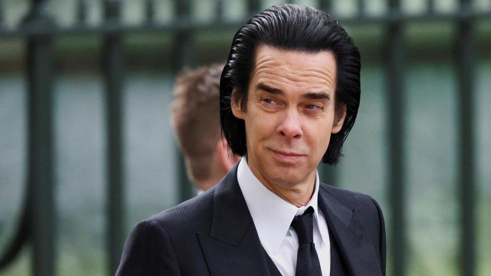 Nick Cave arriving at Westminster Abbey