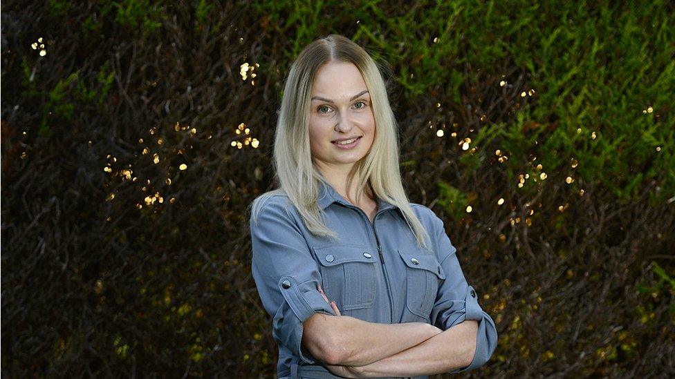 Laura Gruzdaite standing arms folded