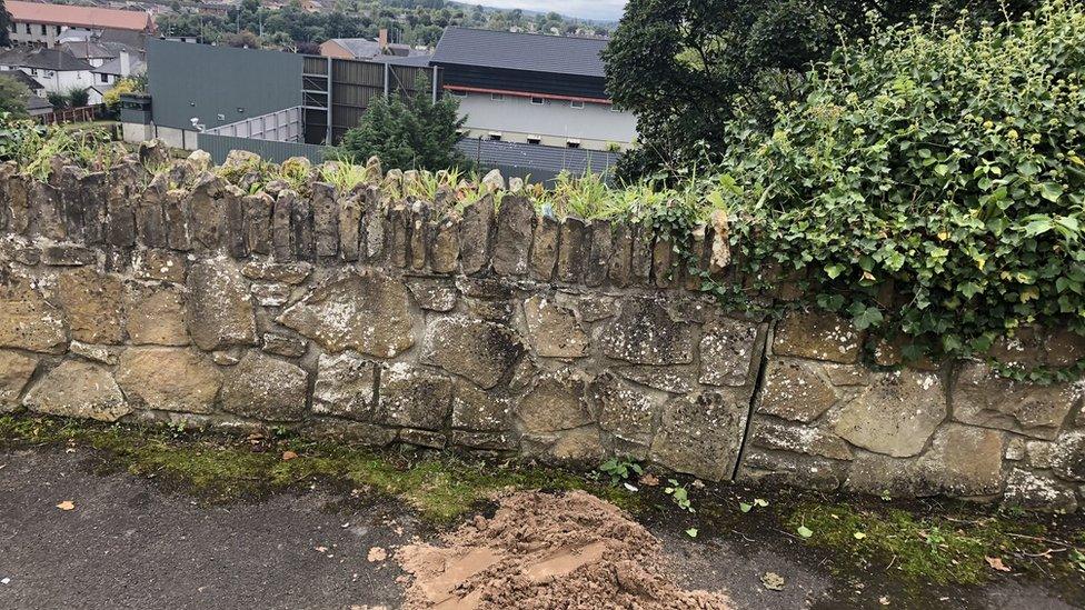 The wall where the bomb was found is close to the local police station and homes