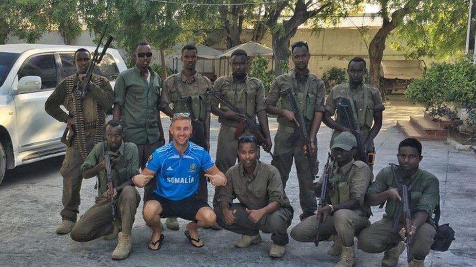 Johnny Ward had an armed guard for his visit to Somalia