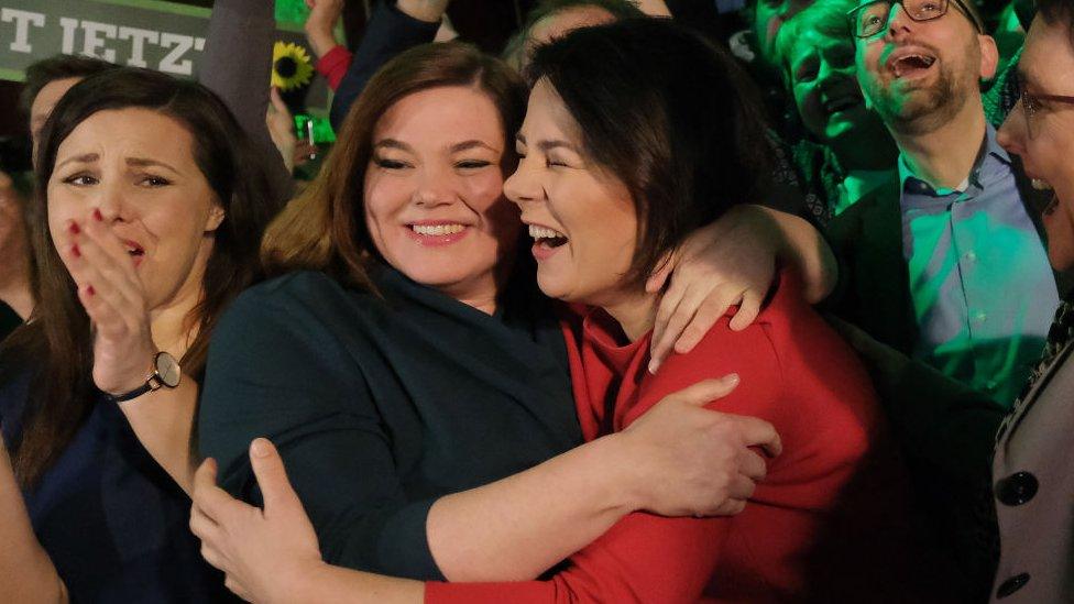 Top Greens candidate Katharina Fegebank (L) celebrates with national co-leader Annalena Baerbock (R)