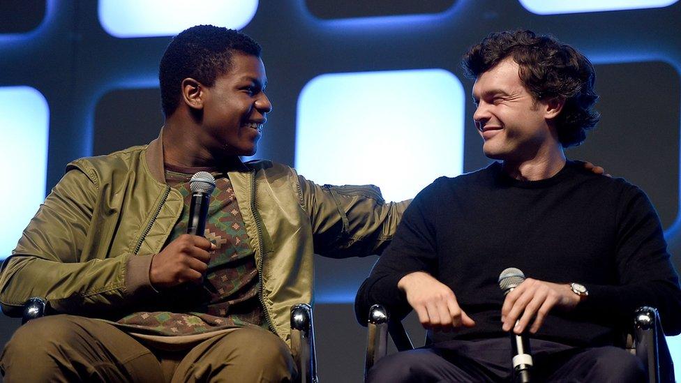 John Boyega (l) and Alden Ehrenreich, on stage at the Star Wars Celebration