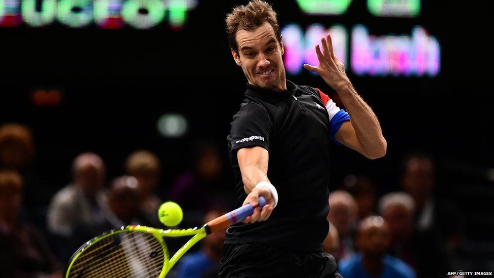 Richard Gasquet hitting a tennis ball