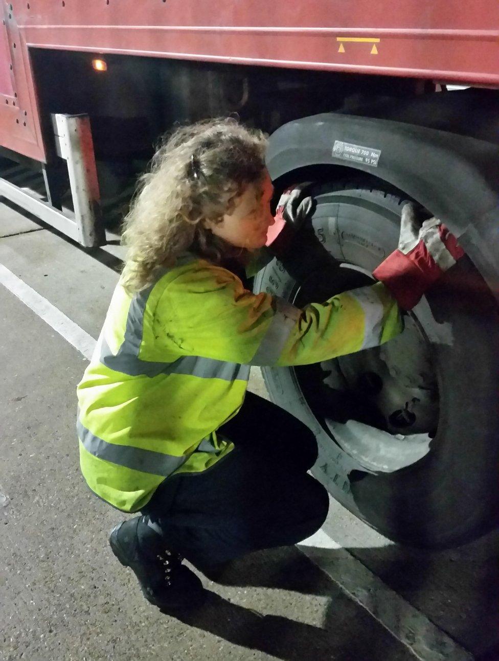 Jenny at the wheel of a truck