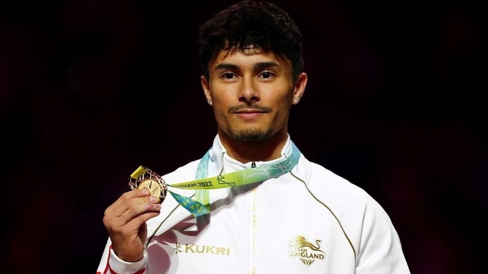 England's Jake Jarman receives his gold medal for the Men's Floor Exercise Final at Arena Birmingham