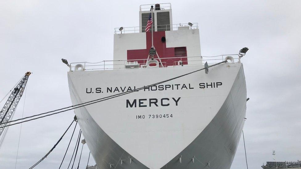 Navy ship docked near the courthouse