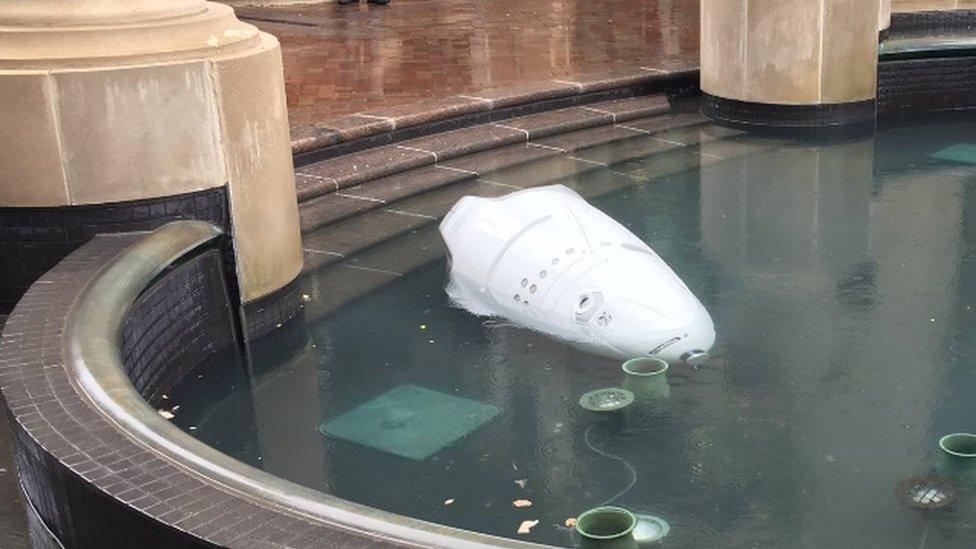 Knightscope robot in a fountain