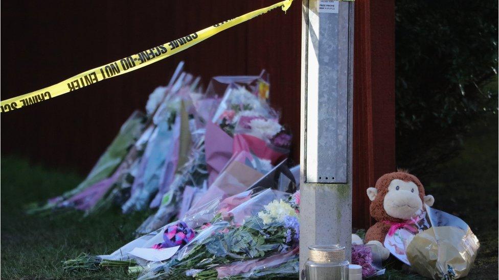 Floral tributes and a teddy bear are left near the crime scene in Alness Drive in the Woodthorpe area of York, after the murder of seven-year-old Katie Rough on January 11, 2017 in York, England.