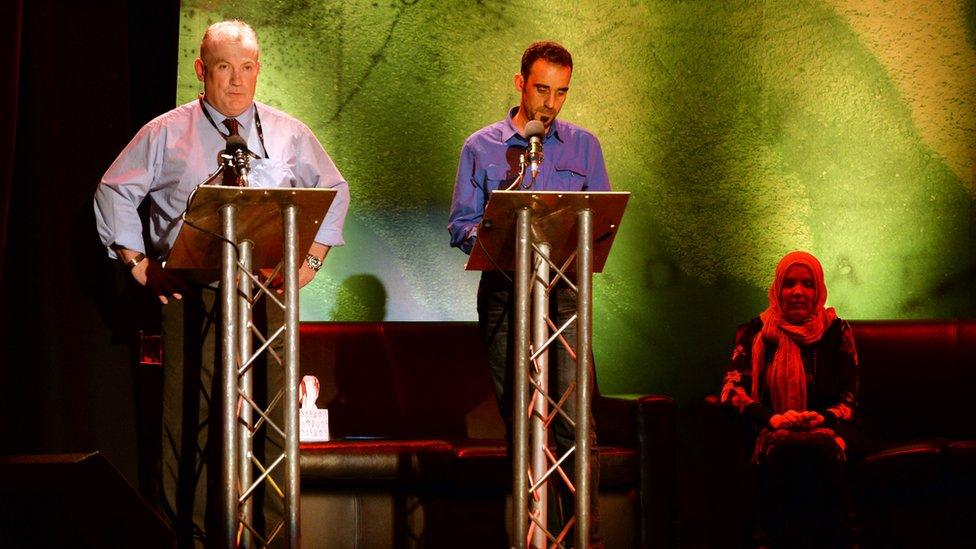 Jonathan Smith speaking at an event for Syrian refugees