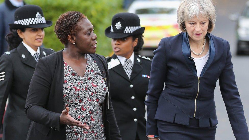 Theresa May outside speech