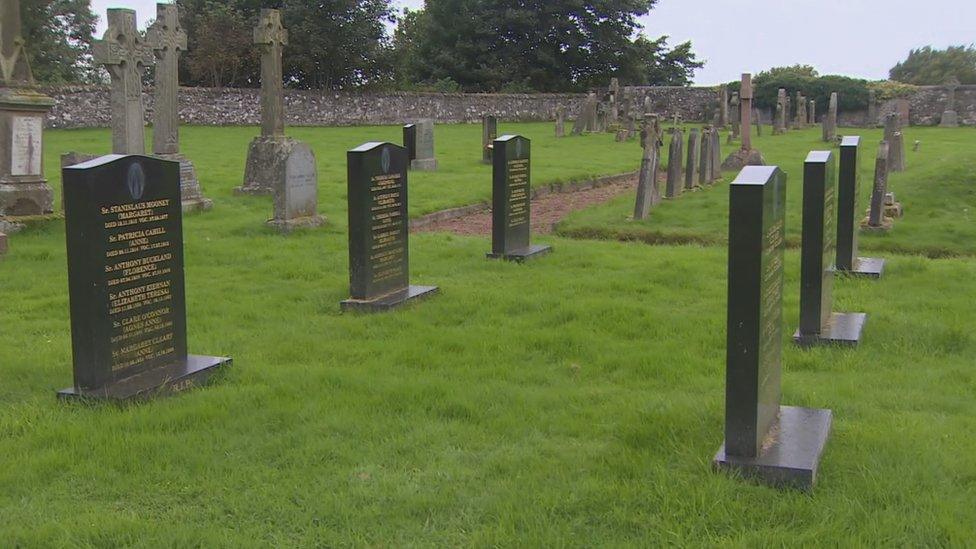 The graves of former nuns lie near the site of the unmarked grave