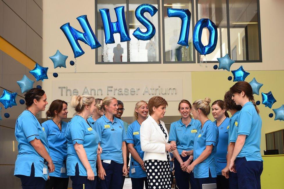 Scotland's First Minister Nicola Sturgeon speaks to NHS staff at the Royal Hospital for Children in Glasgow