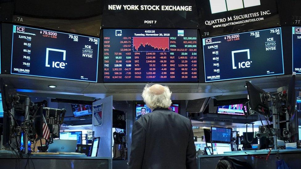 A trader at the NYSE