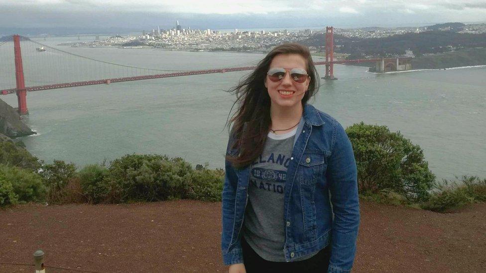 Sarah posing in front of San Francisco's Golden Gate bridge