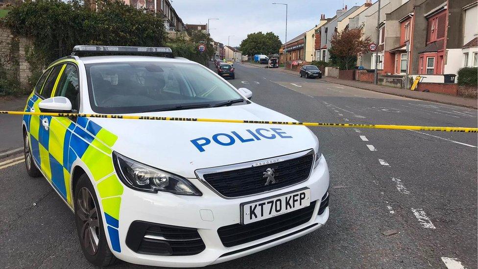 Police car at cordon