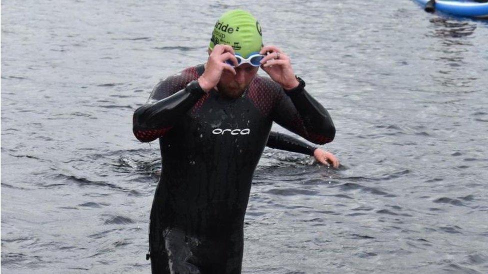 John McDermott swimming in triathlon