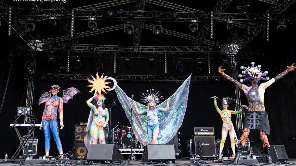 Performers in body paint at the Lechlade Festival