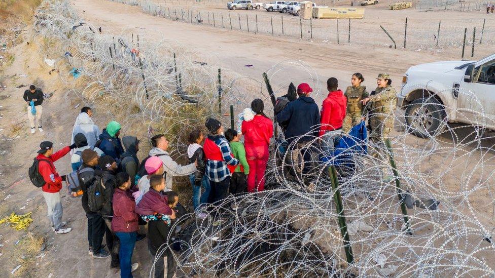 Migrants cross from El Ciudad Juarez, Mexico into El Paso, Texas