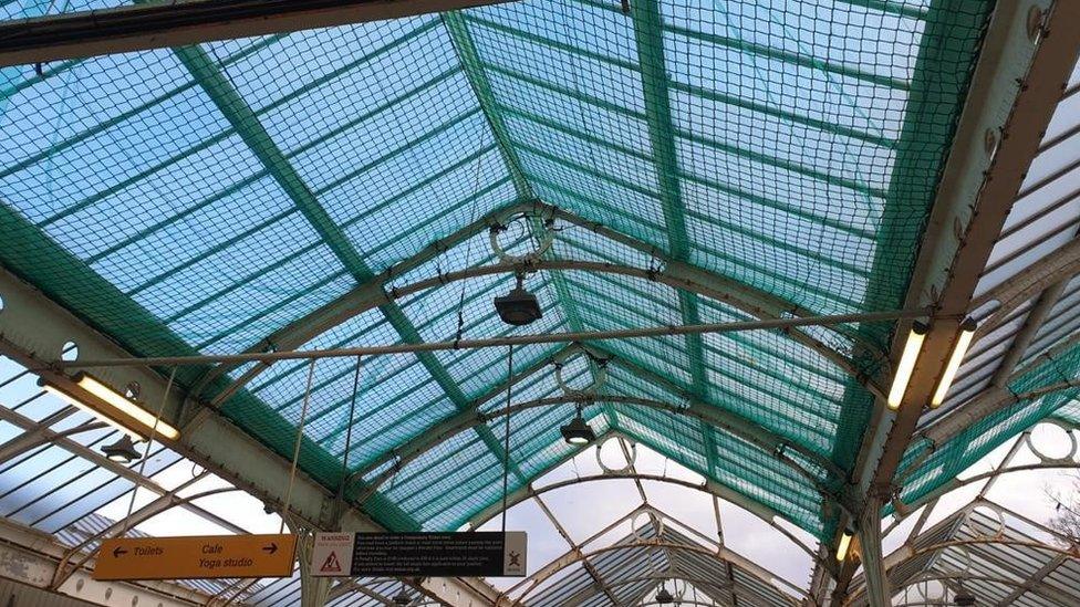 Mesh covering Whitley Bay station's roof