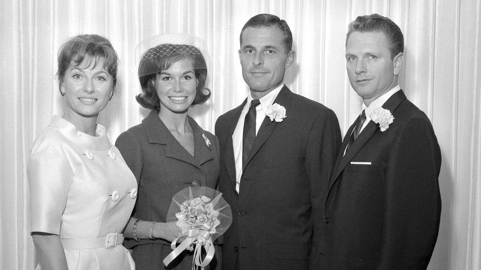 Mary Tyler Moore and Grant Tinker on their wedding day with two guests