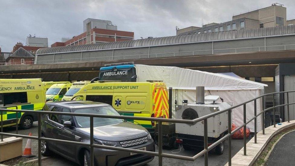 A bus and tent set up as an emergency treatment area outside Leicester Royal Infirmary