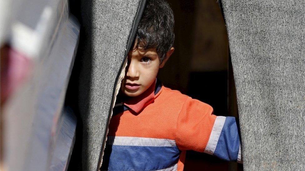 Syrian boy in refugee camp