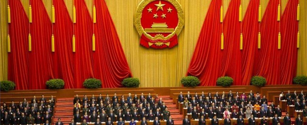 China's top leaders stand during the opening of the National People's Congress. Photo: 5 March 2016