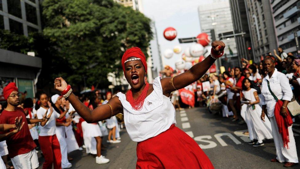 Members of cultural group taking part in a demonstration against the president in Sao Paulo